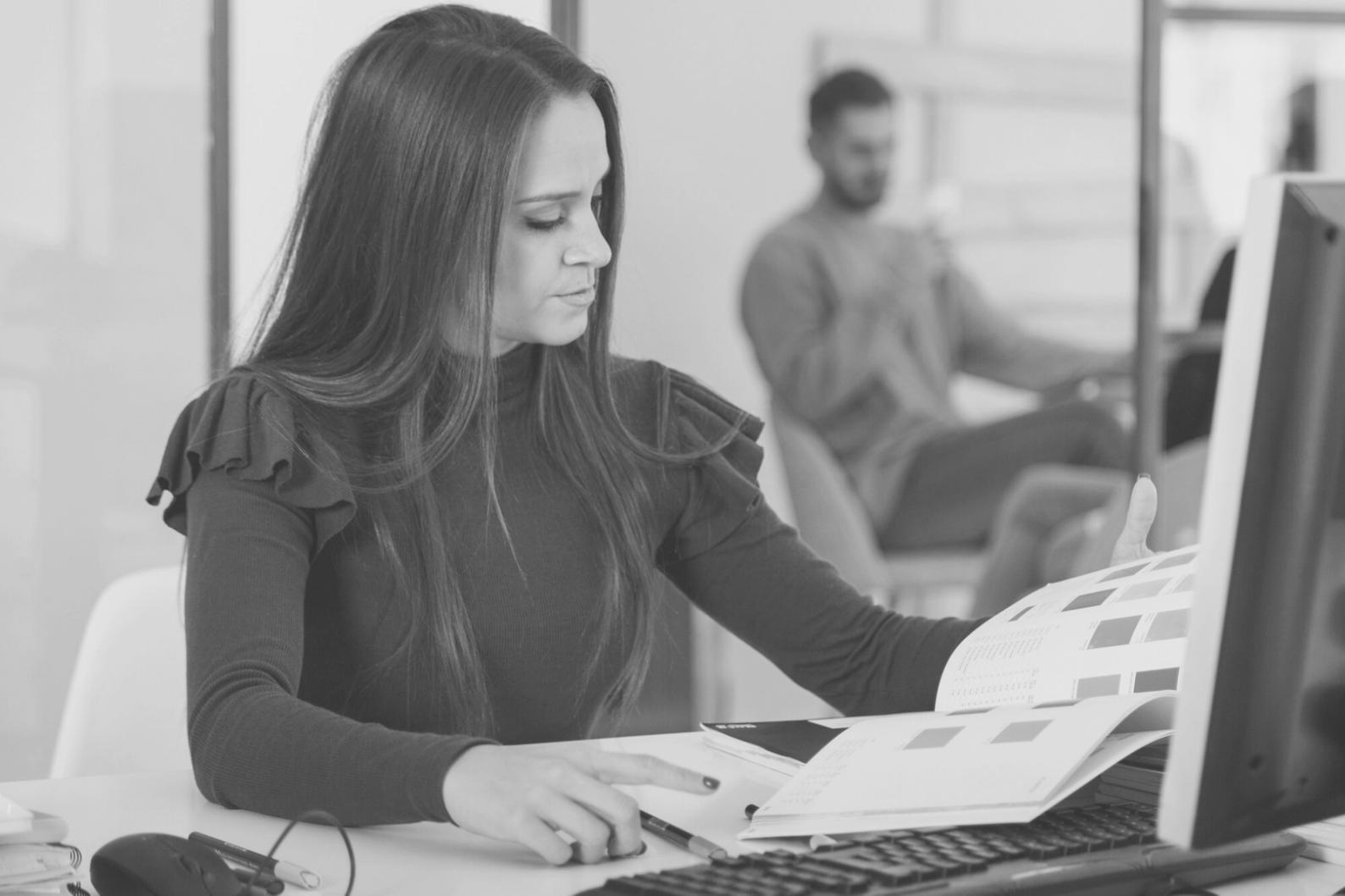 Financial analysts reviewing valuation models during training session